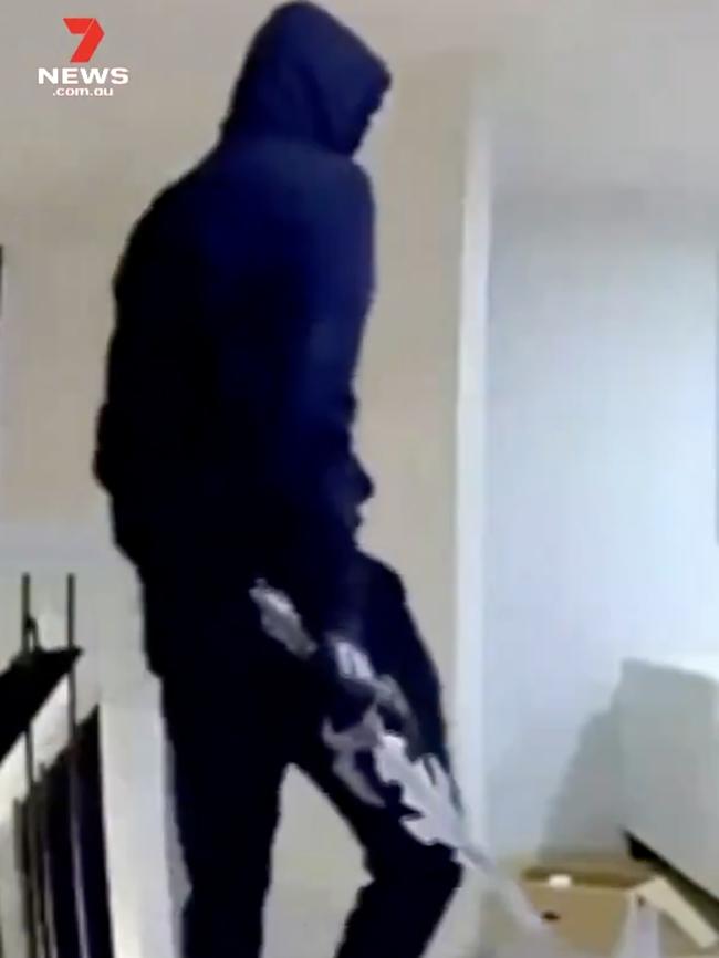 A trio of masked intruders armed with a sword and metal pole held two Lightsview housemates hostage in their own home in Adelaide. They stole car keys, wallets, credit cards and a mobile phone. Picture: 7 NEWS.