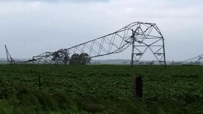 The enduring image of the blackout was of twisted power pylons toppled by high winds near Melrose on September 28, 2016. Picture: Debbie Prosser/AFP