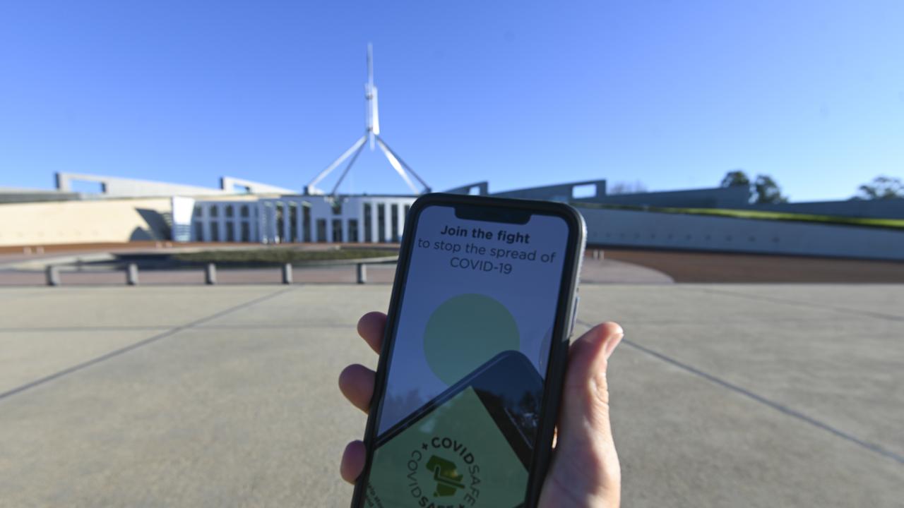 An iPhone displays the COVIDSafe app released by the Australian government in front of Parliament House. Picture: Lukas Coch/AAP