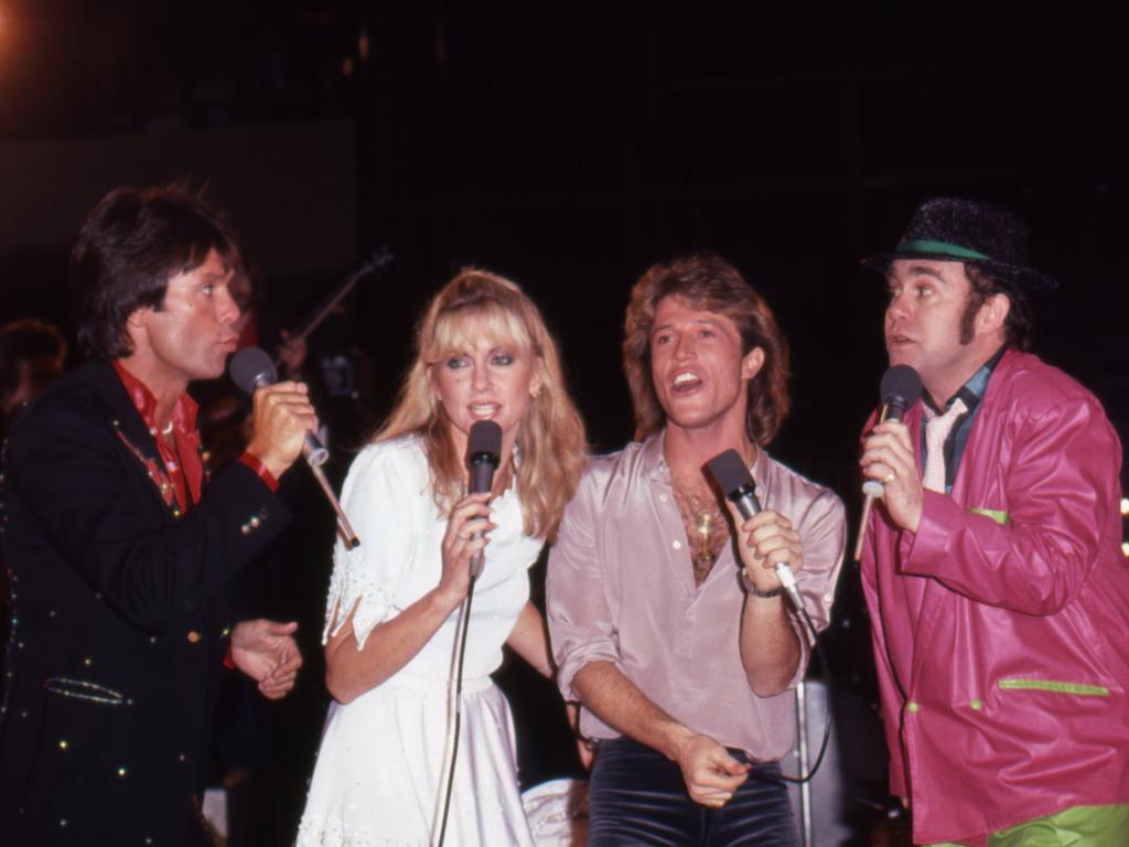 Cliff Richard, Olivia Newton-John, Andy Gibb and Elton John perform on the "Hollywood Nights" TV special in March 1980. Picture: Getty Images)