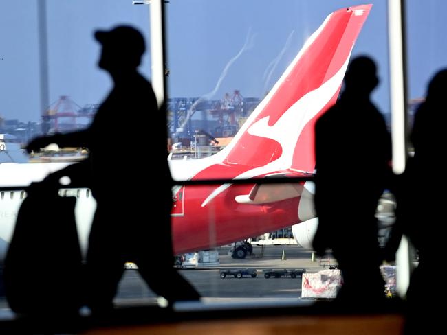 SYDNEY, AUSTRALIA - NewsWire Photos JULY 29, 2022: General scenes of a Qantas plane at the arrival gate at SydneyÃs International AirportPicture: NCA NewsWire / Jeremy Piper