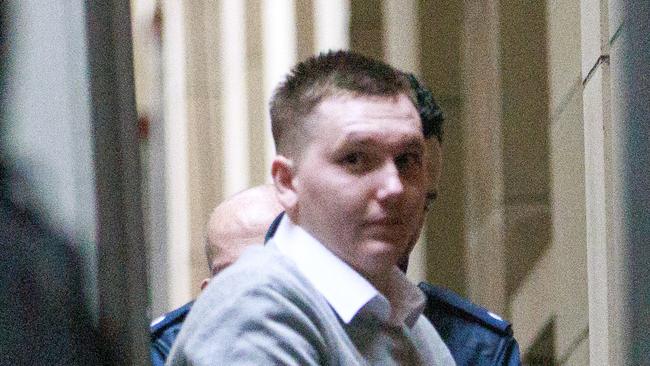 **SEEK LEGAL ADVICE BEFORE PUBLISHING** MELBOURNE, AUSTRALIA - NewsWire Photos - 27 APRIL, 2023: Jordan Bottom, accused of murdering Bradley Lyons, pictured being led into Supreme Court in Melbourne. Picture: NCA NewsWire / David Geraghty