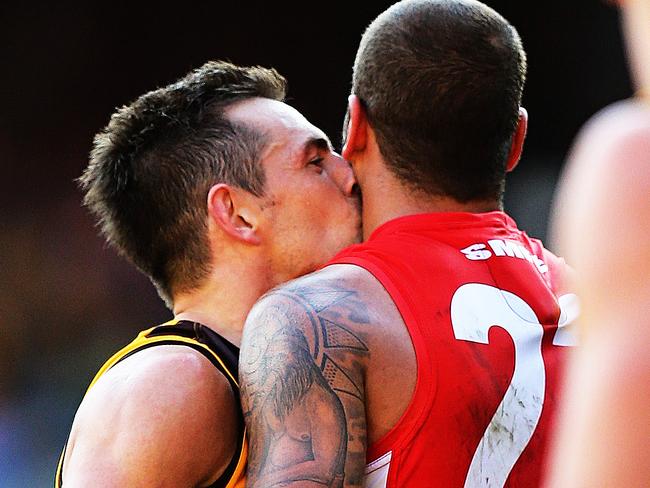 2014 AFL Grand Final match between Hawthorn Hawks and the Sydney Swans at the MCG Melbourne Cricket Ground on September 27, 2014. AFLGF2014. Luke Hodge gives his old team mate a kiss (kiss of death). Picture: Tim Carrafa