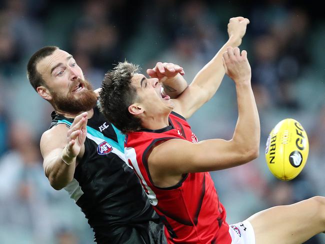 AFL - Saturday, 12th September, 2020 - Port Adelaide v Essendon at the Adelaide Oval. Port Adelaide's Charlie Dixon and Essendon's Brandon Zerk-Thatcher Picture: Sarah Reed