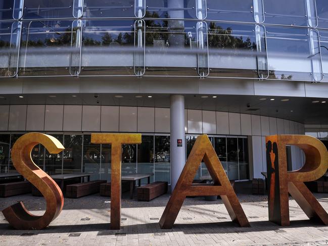 A sign stands outside The Star casino and event centre in Sydney on September 2, 2024. Troubled resort and casino operator Star Entertainment was temporarily delisted from the Australian Securities Exchange on September 2 after failing to post its annual financial results. (Photo by DAVID GRAY / AFP)