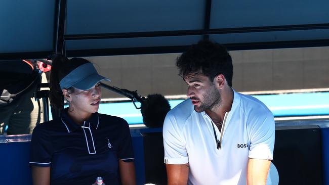 MELBOURNE, AUSTRALIA - JANUARY 16: Ajla Tomljanovic of Australia sits with Matteo Berrettini of Italy during a practice session ahead of the 2022 Australian Open at Melbourne Park on January 16, 2022 in Melbourne, Australia. (Photo by Clive Brunskill/Getty Images)