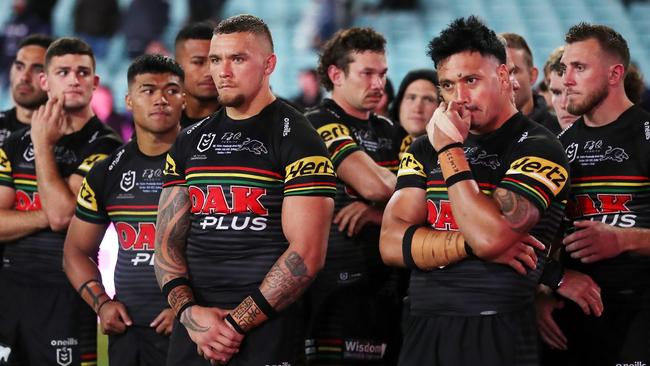 SYDNEY, AUSTRALIA - OCTOBER 25: James Fisher-Harris of the Panthers and team mates look dejected after losing the 2020 NRL Grand Final match between the Penrith Panthers and the Melbourne Storm at ANZ Stadium on October 25, 2020 in Sydney, Australia. (Photo by Cameron Spencer/Getty Images)