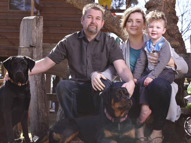 Paramedic Andrew Brooker was with his partner Laura and son Luca when he jumped into the surf to save two young children from drowning at Wollongong. Picture: AAP/Flavio Brancaleone