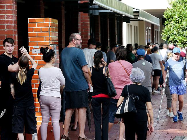 People lined up at Centrelink in Cairns CBD, Queensland. Picture: Stewart McLean