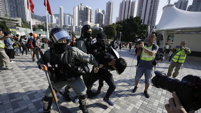 Police detain a protester in Hong Kong. Picture: AP