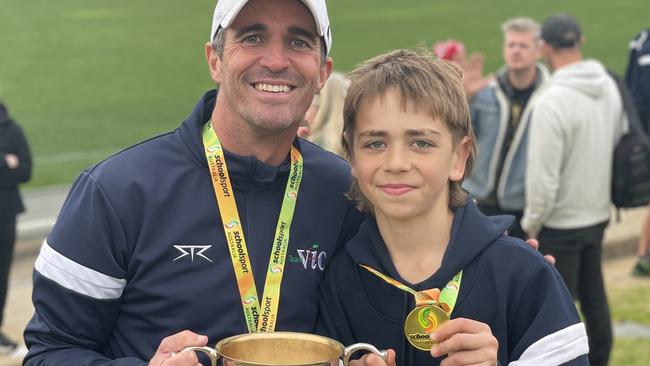 Victorian coach Leigh McQuillen and Sidney McLaughlin, son of AFL boss Gillon.