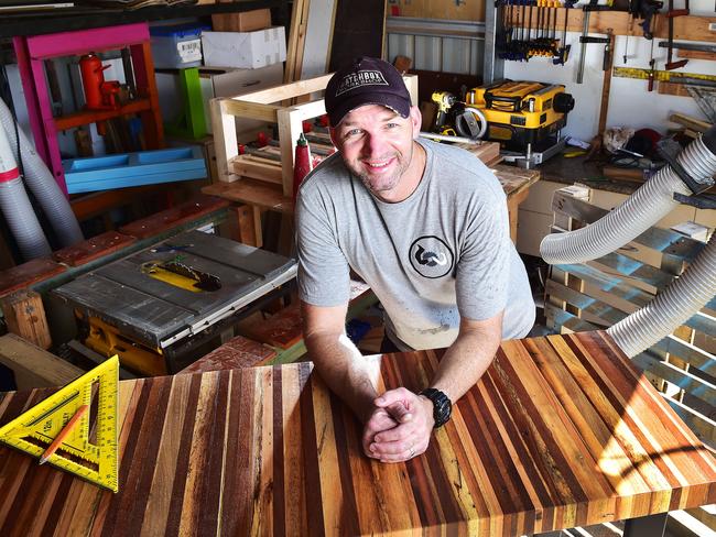 Mark Dainer 'Pallet Punter' pictured in his home workshop. Picture: Shae Beplate.