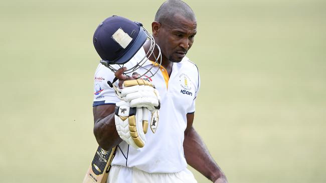 Brenton Parchment walks off after making a century. Picture: Andy Brownbill