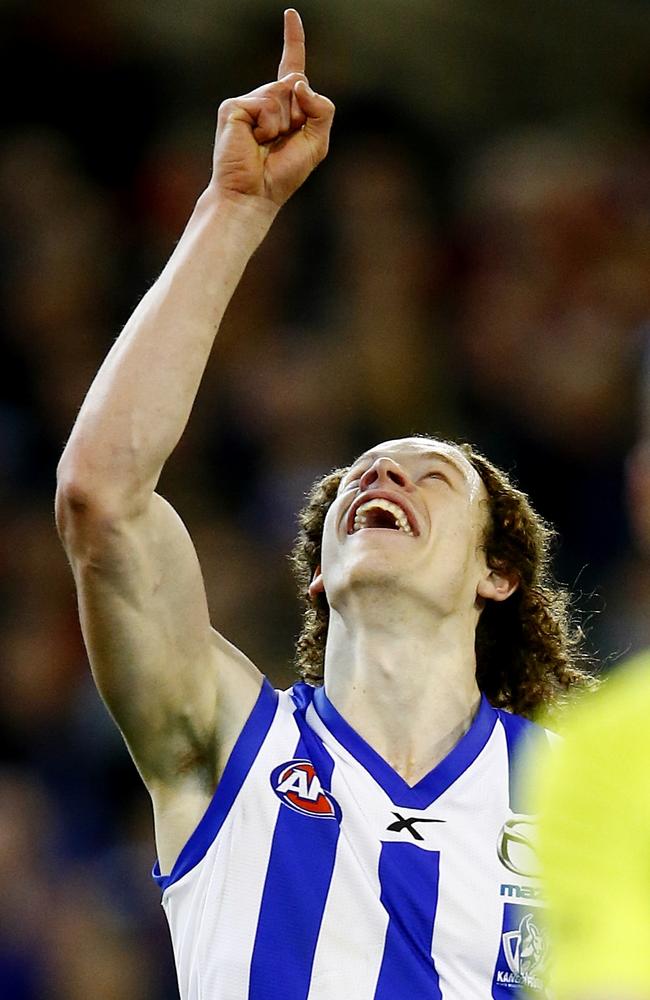 Kangaroo Ben Brown points to the skies after kicking his first AFL goal. Picture: Michael Klein