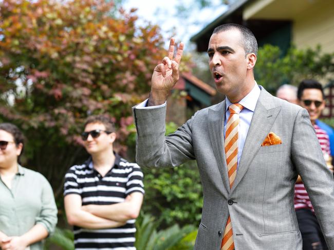 SYDNEY, AUSTRALIA - DECEMBER 12 2020: Auctioneer Michael Garofolo in action during a home auction in West Ryde, in Sydney Australia. Picture: Newscorp: Daily Telegraph / Gaye Gerard