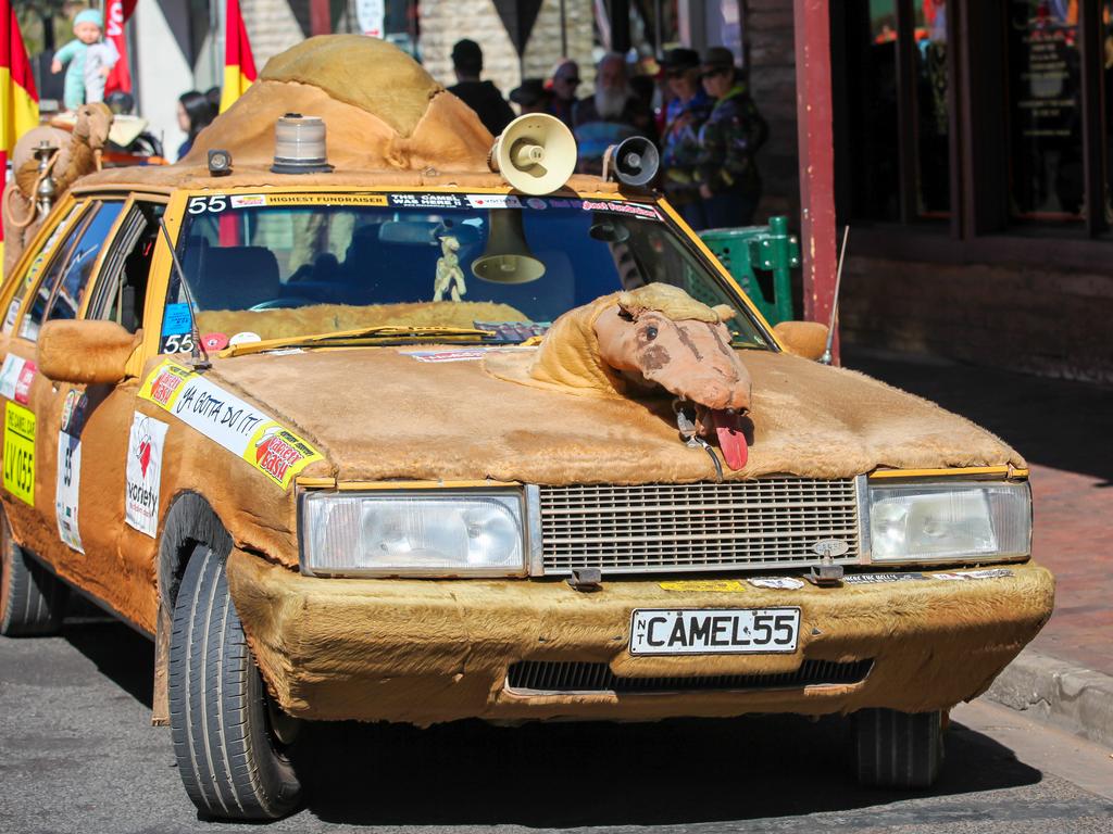 A camel-themed car spits water on onlookers. Picture: Social Media NT