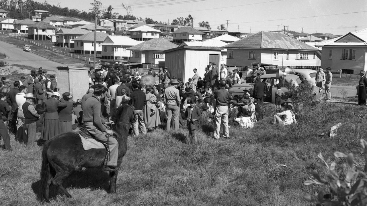 Stafford locals gather to complain about water drainage woes in 1955. Picture: Ray Saunders