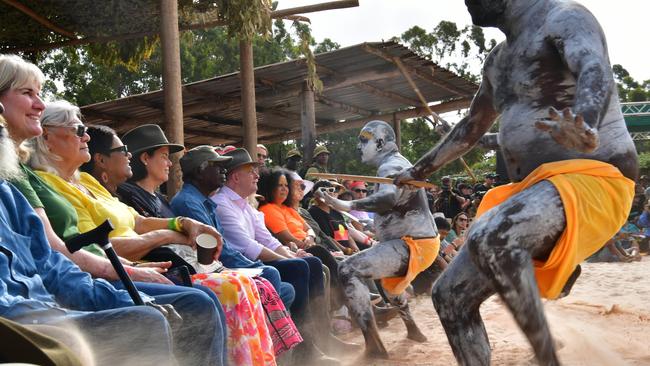 Yolngu yellow flag dancers perform in front of Prime Minister Anthony Albanese on the Bunggul at day one of Garma in August.