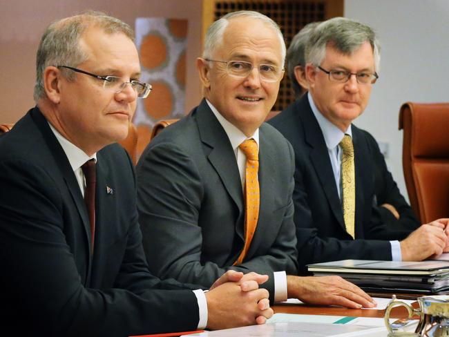 Malcolm Turnbull, flanked by Treasurer Scott Morrison and Dr Martin Parkinson at today's COAG meeting. Picture: Ray Strange