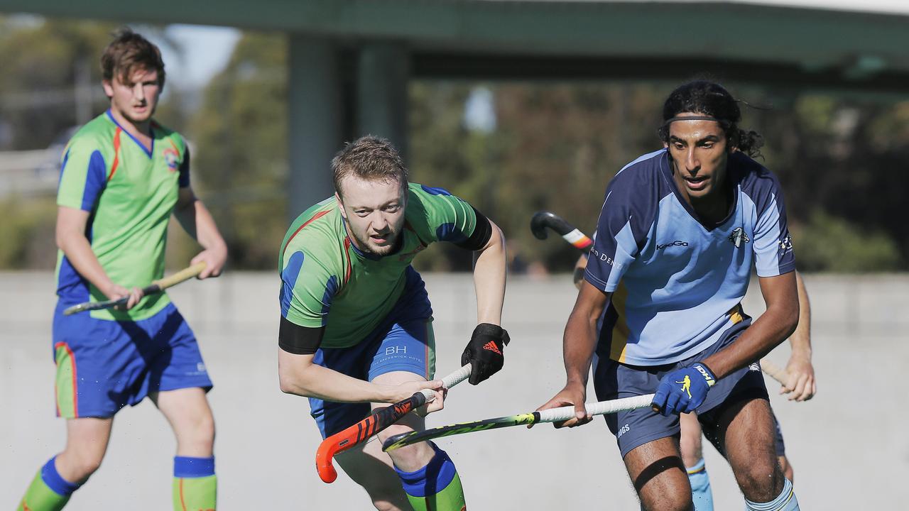 <p>Gobind Gill and Nick Leslie in the North-West Grads v OHA men's hockey at the Tasmanian Hockey Centre, March, 2019. Picture: MATHEW FARRELL</p>