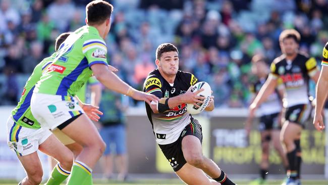 Panthers halfback Nathan Cleary takes on the Raiders defence.