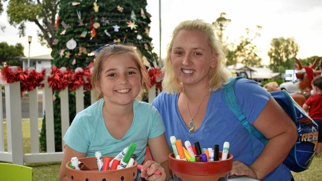 JINGLE BELLS: Mia Sinclair and Kaitlin Rix. Picture: Ebony Graveur