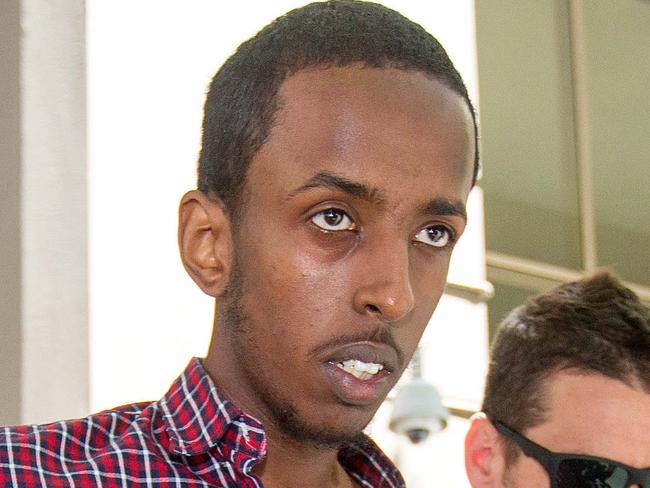 20-year-old Werribee man - Ali Khalif Shire Ali, born in Australia to Somali parents - was taken into custody by Special Operations Group police just before 3pm in Werribee on Monday. Picture: Mark Stewart