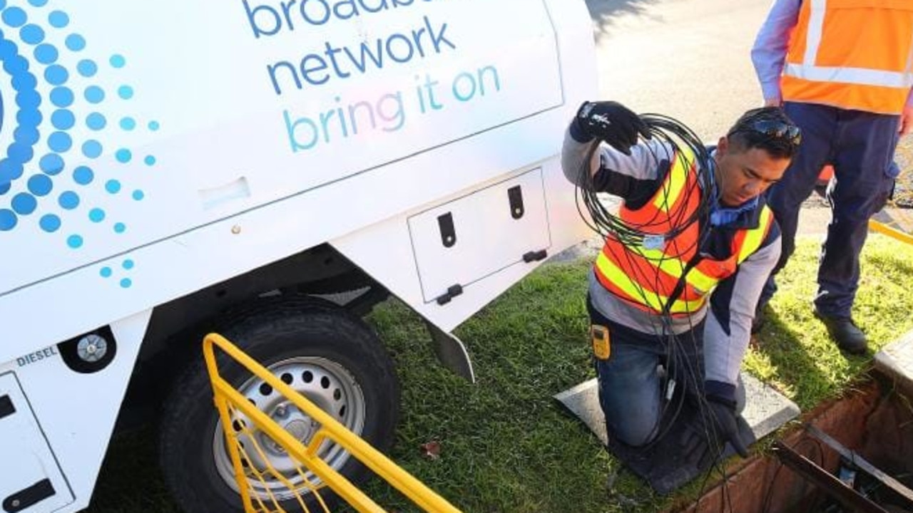 NBN contractors laying cables at one of the 11.5 million premises that will be ready to connect or already connected by the end of June.