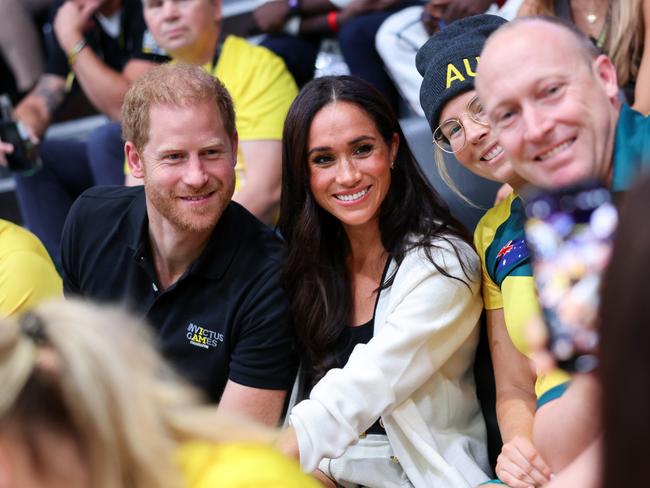 The couple posed for selfies with the assembled Aussies. Picture: Getty Images for the Invictus Games Foundation