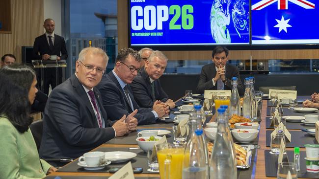 Prime Minister Scott Morrison (second from left) has a breakfast meeting with Macquarie’s Shemara Wikramanayake during the COP26 Climate Conference in Glasgow in November last year. Picture: Annabel Moeller