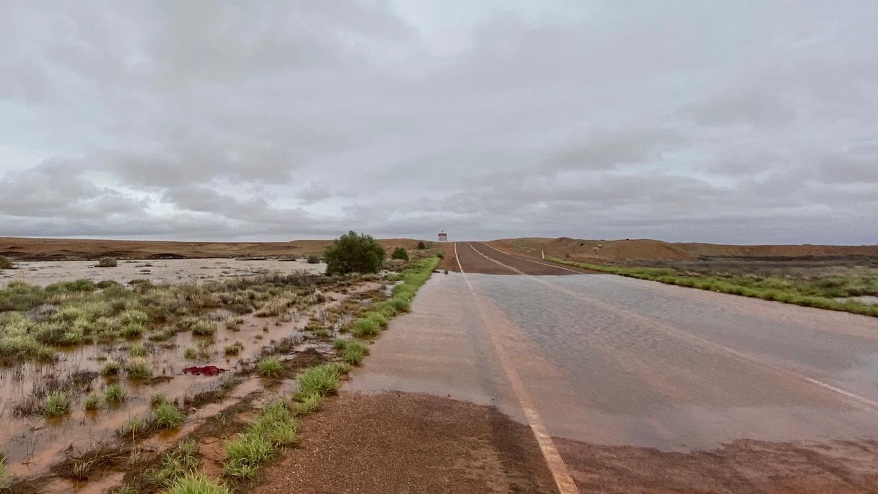 Flooding across Kempe Rd Coober Pedy. Picture: Dean Miller