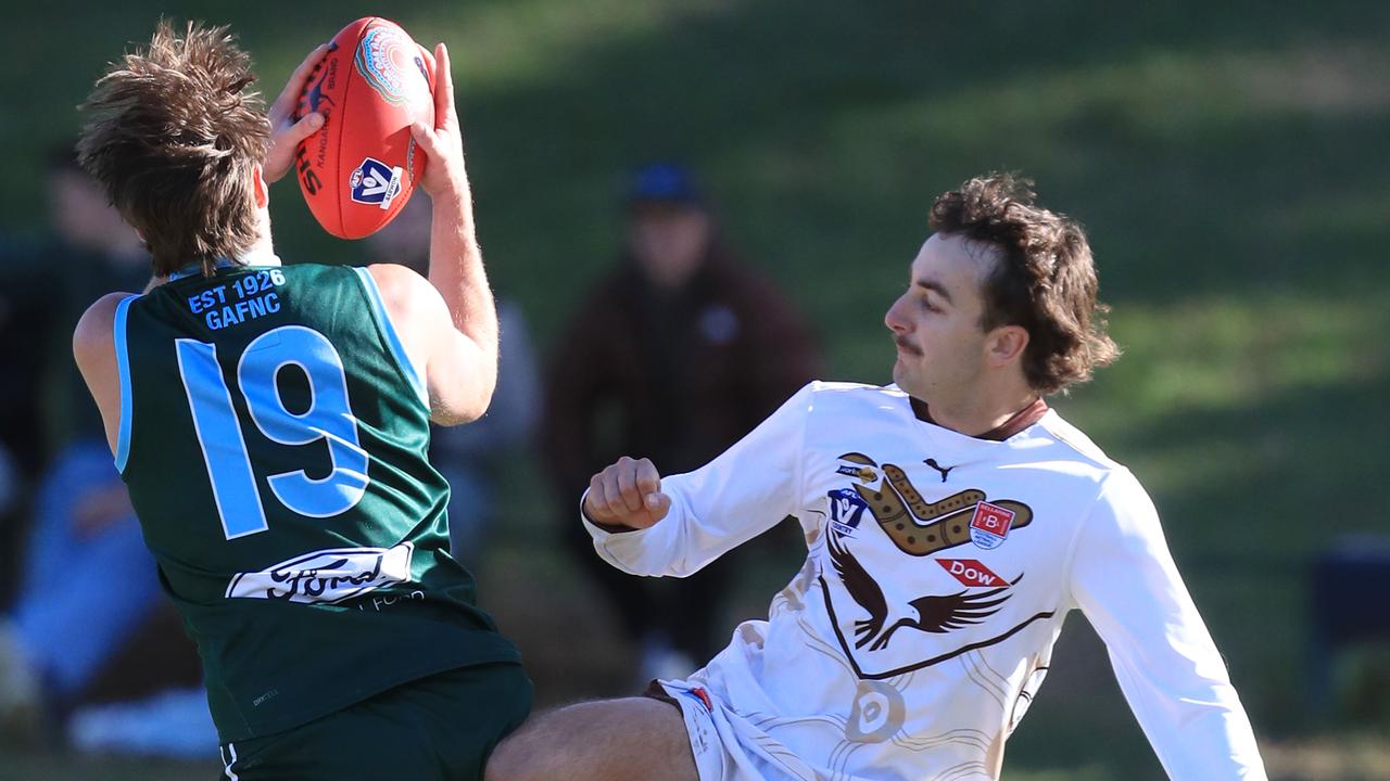 Football BFNL - Geelong Ammos v Drysdale.
Geelong Ammos 19 Daniel Grose marks as  Drysdale 14 Jake Hargreaves  tries to spoil 
Picture: Mark Wilson