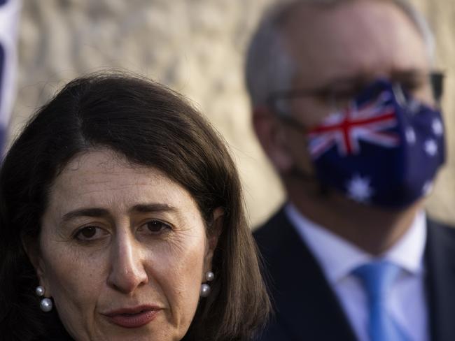 SYDNEY, AUSTRALIA - JULY 13: NSW Premier Gladys Berejiklian speaks during a press conference at Kirribilli House on July 13, 2021 in Sydney, Australia. Prime Minister Scott Morrison and NSW Premier Gladys Berejiklian have announced a financial assistance package to support NSW households and businesses affected by the current COVID-19 lockdown. The combined federal and state support package will see the COVID-19 disaster payment increased to $600 from week four of lockdown, if a person has lost 20 or more hours of work a week, or $375 if a person has lost between eight and 20 hours of work a week. A new business support payment will also be available to entities with an annual turnover between $75,000 and $50 million who can demonstrate a 30 percent decline in turnover. COVID-19 lockdown restrictions are currently in place across Greater Sydney, the Blue Mountains, the Central Coast and Wollongong as NSW continues to record new community COVID-19 cases. All residents are subject to stay-at-home orders and are only permitted to leave their homes for essential reasons, including purchasing essential goods, accessing or providing care or healthcare, work, education and exercise. (Photo by Jenny Evans/Getty Images)