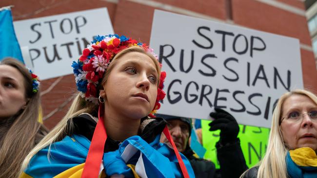 Geopolitics is scary again. Even countries under US protection, such as Japan and South Korea, might reasonably worry about the reliability of their ally given the state of domestic American politics, and want nuclear ­deterrence. Above, a ‘Stand With Ukraine’ rally outside the Russian mission in New York City. Picture: AFP