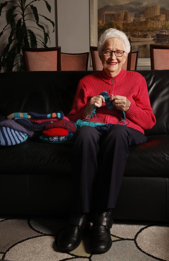 Beverley Goss 89 who continues to live independently at home has knitted hundreds of beanies for charity over the years choosing a different charity each winter to donate her knitted beanies to. This year she has chosen Tassie Mums. Picture: Nikki Davis-Jones