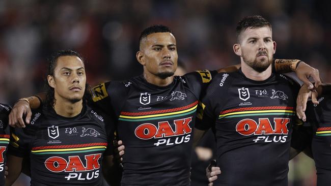 (L-R) Jarome Luai, Stephen Crichton and Matthew Eisenhuth of the Panthers line up prior to the match against the Knights. Picture: Jason McCawley/Getty Images