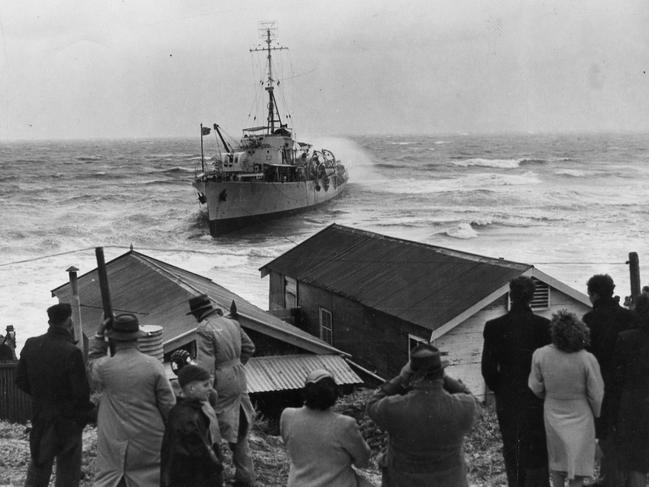 Adelaide experienced one of its fiercest ever storms on record on April 11, 1948. The storm grounded the WWII frigate HMAS Barcoo. Photo: The Advertiser/Krischock.