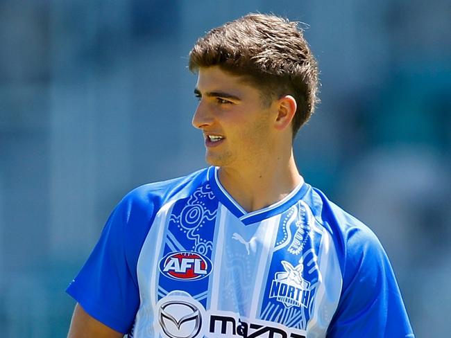 PERTH, AUSTRALIA - MARCH 01: Harry Sheezel of the Kangaroos looks on as he warms up during the 2025 AAMI AFL Community Series match between West Coast Eagles and North Melbourne Kangaroos at Hands Oval on March 01, 2025 in Bunbury, Australia. (Photo by James Worsfold/Getty Images)