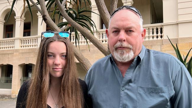 Clare Spicer, the daughter of Angela Darragh, and her father Dean Spicer outside Wollongong Courthouse on Monday. Picture: Dylan Arvela