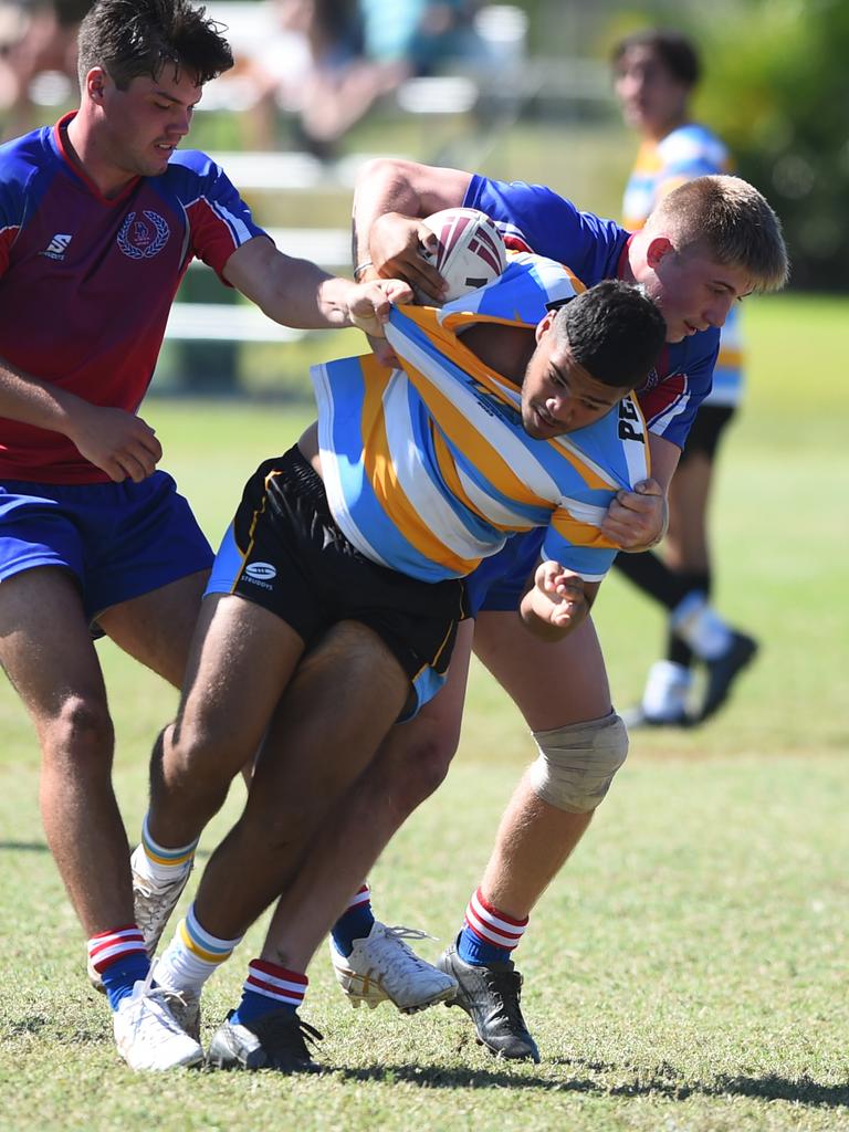 Boys Rugby League State Championship held at Northern Division, Brothers Leagues ground, Townsville. 16-18 years. Peninsula (stripe) v Darling Downs (blue/purple). Jason Hastie of Mareeba SHS