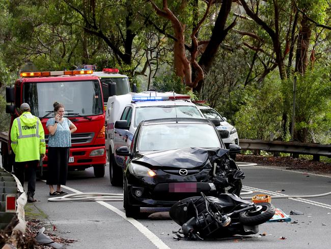 A car and motorbike collided head-on along Wakehurst Parkway at Narrabeen in February with the female rider of the bike taken to Royal North Shore Hospital in a critical condition. Picture: Toby Zerna