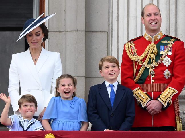 Princess Charlotte of Wales and Prince George of Wales (centre) will walk with their great-grandmother’s coffin. Picture: Daniel Leal / AFP