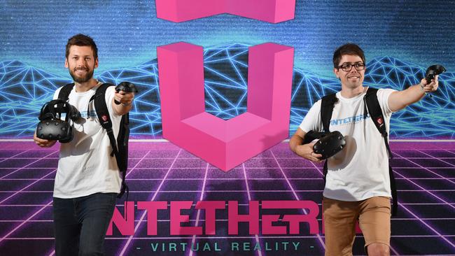 “<i>I can hack you back in time.</i>” Tom Berzins and Tommy Baxter at Untethered VR. Picture: AAP / Keryn Stevens