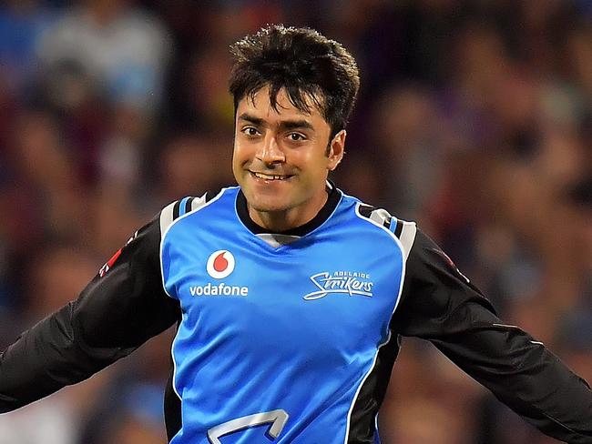 ADELAIDE, AUSTRALIA - DECEMBER 31:  Rashid Khan of the Adelaide Strikers celebrates after taking a wicket during the Big Bash League match between the Adelaide Strikers and the Brisbane Heat at Adelaide Oval on December 31, 2017 in Adelaide, Australia.  (Photo by Daniel Kalisz/Getty Images)