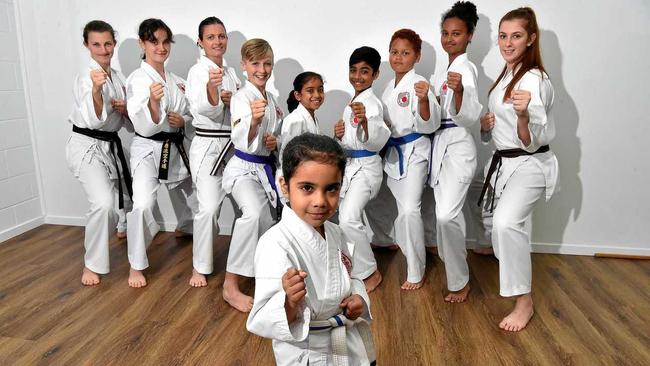 READY TO FIGHT: Sunshine Coast Karate members (back, from left) Klaudia Caston, Sami Phillips, Rosemarie Caston, Patrick Edwards, Raiyan Khan, Na'ila Khan, Miguel Hardy, Faith Hardy, Renae Saunders and (front) Mahirah Khan, 5 are travelling to Canada for the world championships. Picture: Warren Lynam