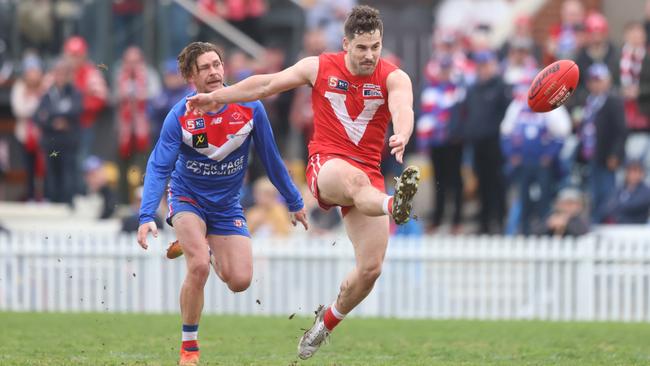 North Adelaide’s Harrison Elbrow boots a long-range goal against Central District at Prospect Oval on Saturday. Picture: Cory Sutton