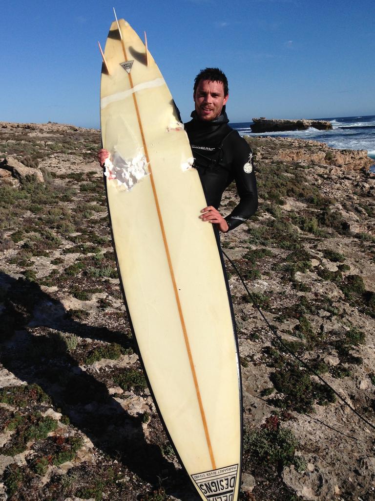 Elliston Mayor Andrew McLeod with his damaged board, back in 2014.