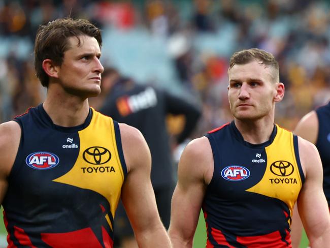 MELBOURNE, AUSTRALIA - JUNE 01: Brayden Cook and his Crows' team mates look dejected after losing the round 12 AFL match between Hawthorn Hawks and Adelaide Crows at Melbourne Cricket Ground, on June 01, 2024, in Melbourne, Australia. (Photo by Quinn Rooney/Getty Images)