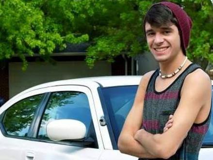 Generous act ... Tanner Brownlee with his late dad's police car that was given to him by a man who bought it at auction. Picture: Tanner Brownlee / Facebook