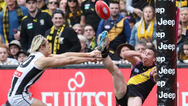 Richmond's Jack Higgins kicks an amazing goal .Pic: Michael Klein